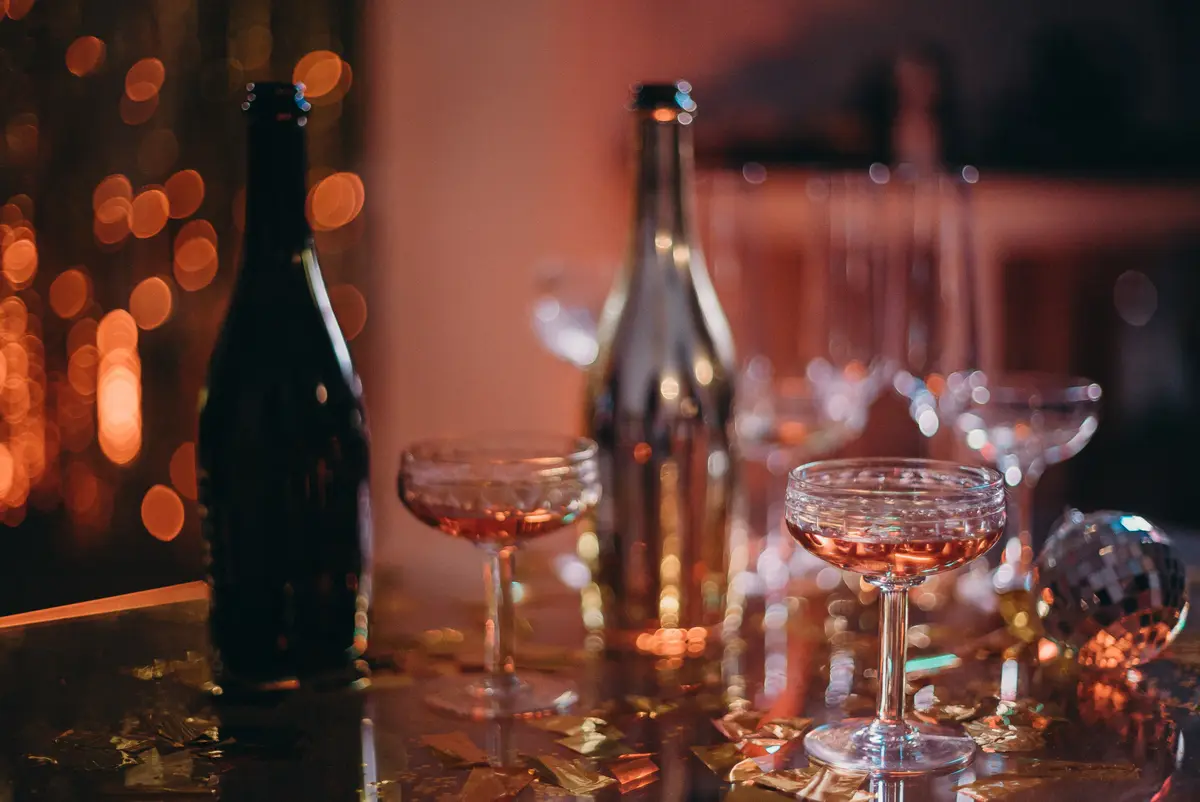 Glasses raised in a toast at a celebration