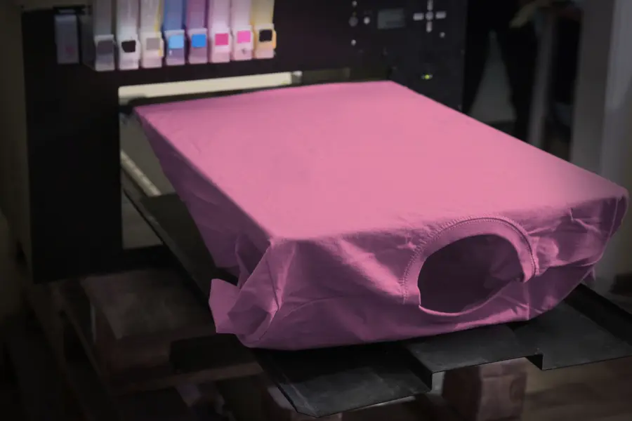 Custom t-shirt on a screen-printing press